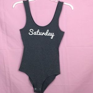 “Saturday” onesie top.